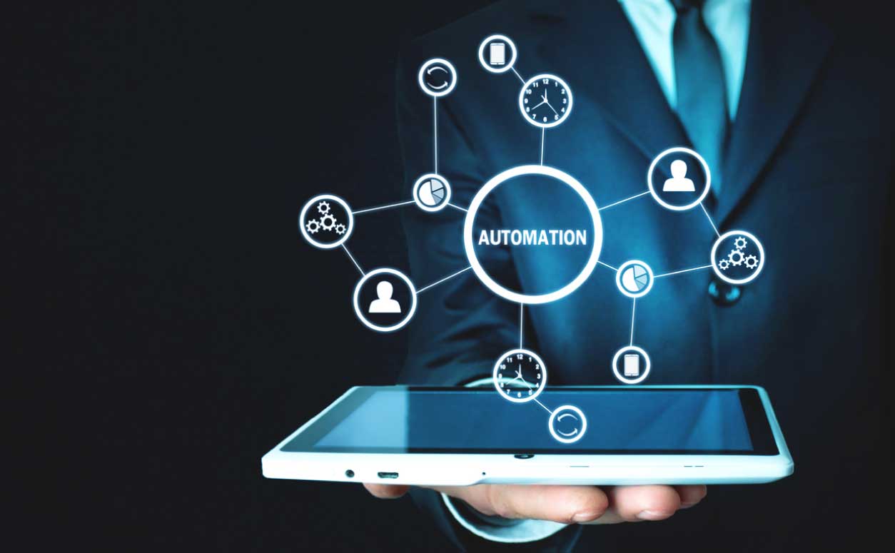 Lower-Your-Staffing-Costs-with-Automated-After-Hours-HVAC-Scheduling man holding smartphone with words automation